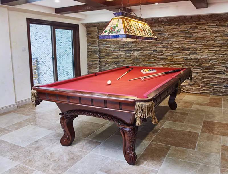 ornate engraved billiards table