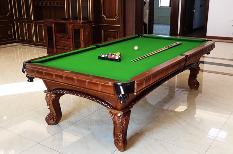 ornate engraved billiards table